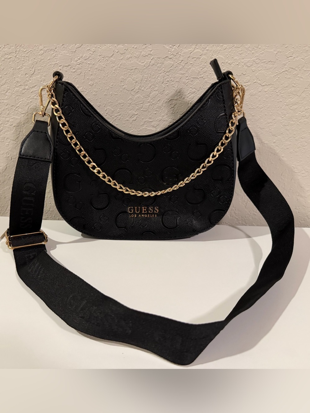 GUESS Black Embossed Logo Hobo with Gold Chain Accent